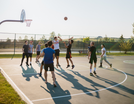 group of people playing basketball Irish