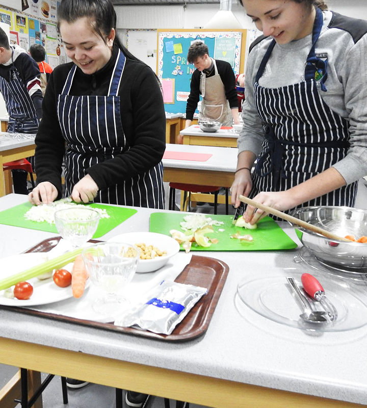 Two students cooking