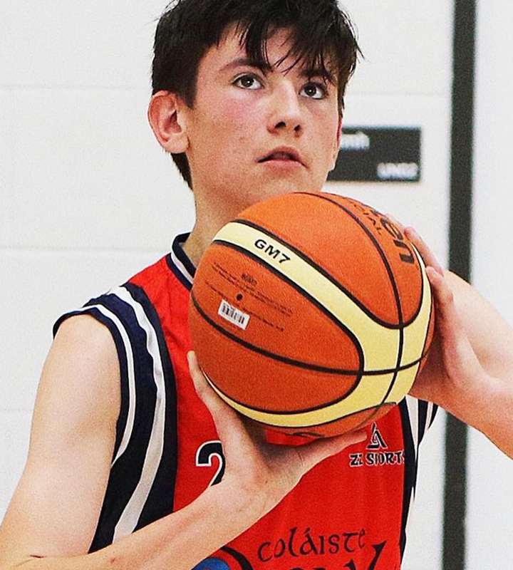 A students playing basketball