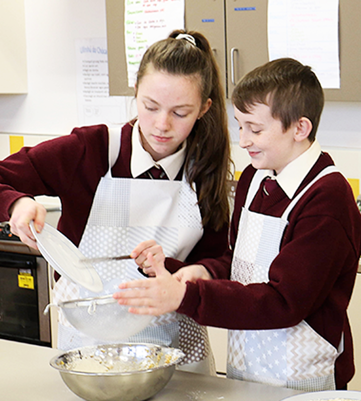 Two students cooking