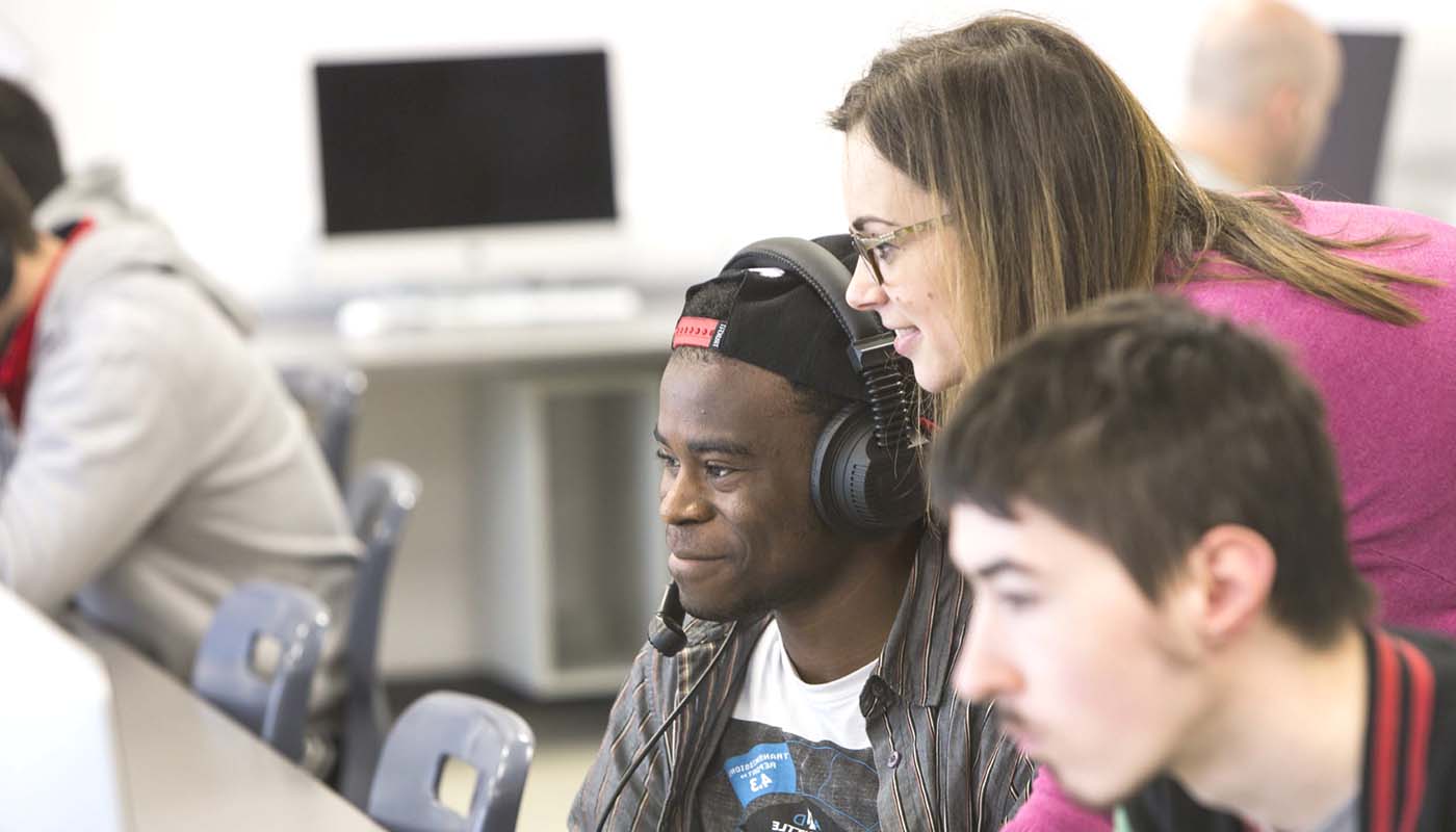 Teacher with two students half-image-width